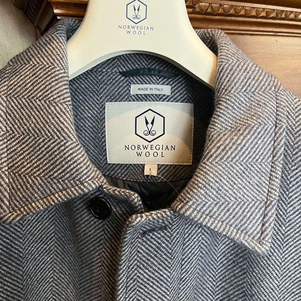 Luxury spread collar herringbone coat in light blue/grey. Similar to Moncler